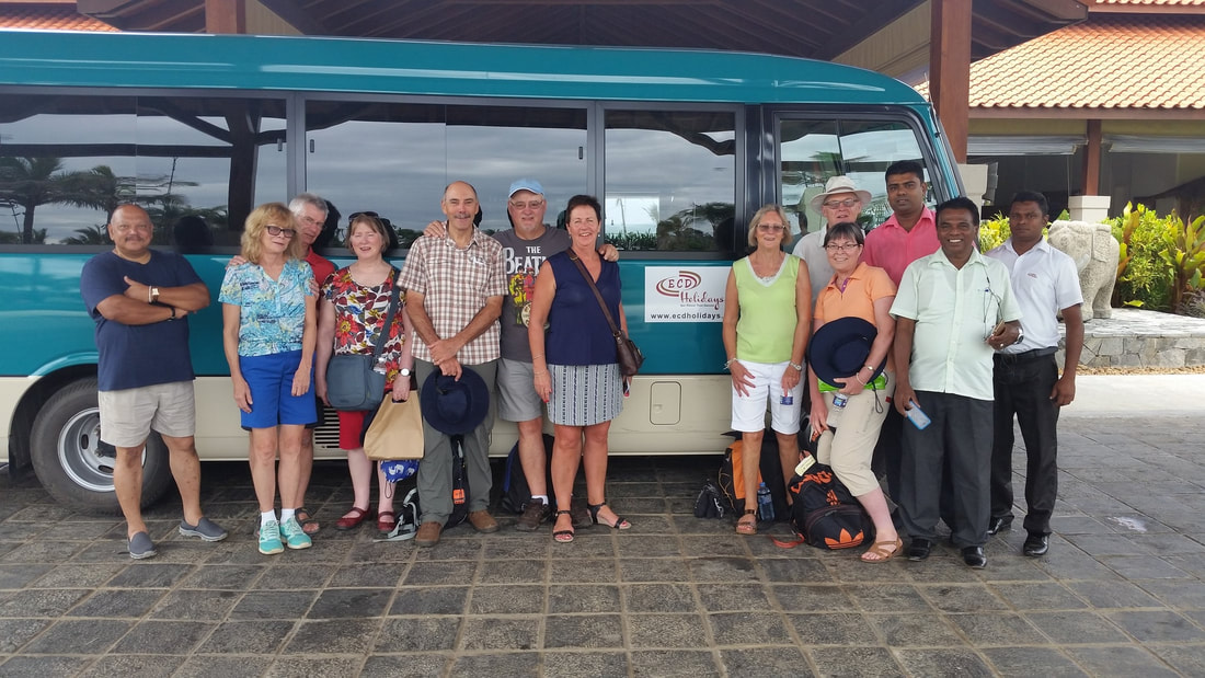 Pete's Travelling Pans Tour bus with tour group, Pieter Siebel, Susan Siebel and local guides