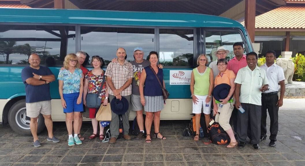 Tour group with bus, Pieter Siebel and local guides
