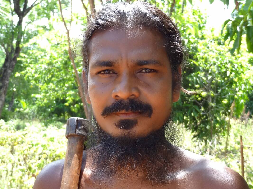 Indigenous Vedda man with tool